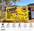 Chop the Crocodile card sleeve displayed in an Australian outdoor setting, with a feature panel highlighting card protection, durable PETG construction, Swiss 3D printing, Australian design and Layer Shed humour. The yellow sleeve features the Chop the Crocodile artwork and 100% Aussie Bank Cruncher insignia.